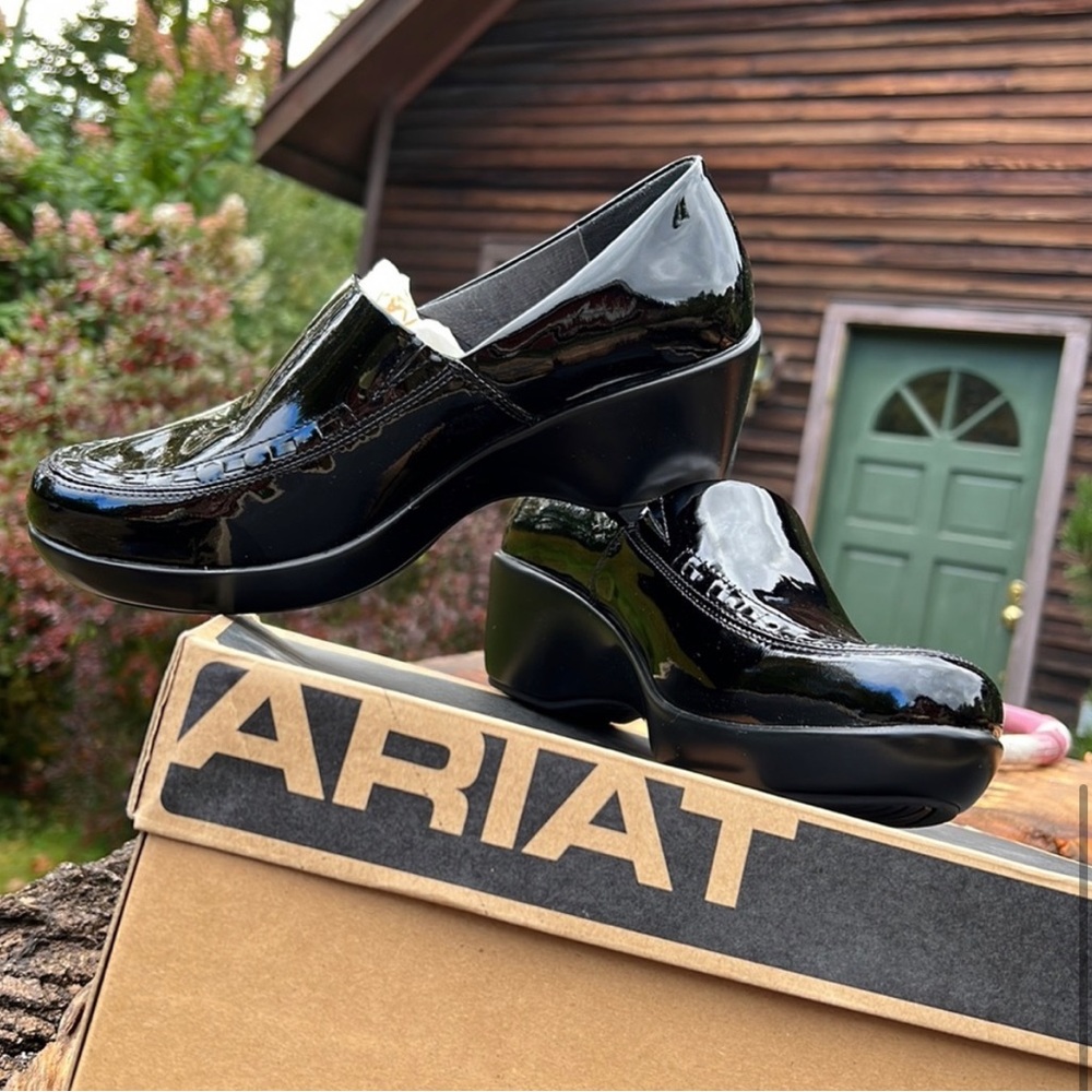 Beautiful Patent leather clogs in black color